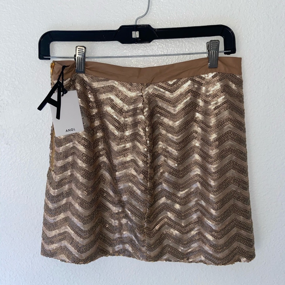 Sequins pencil skirt.